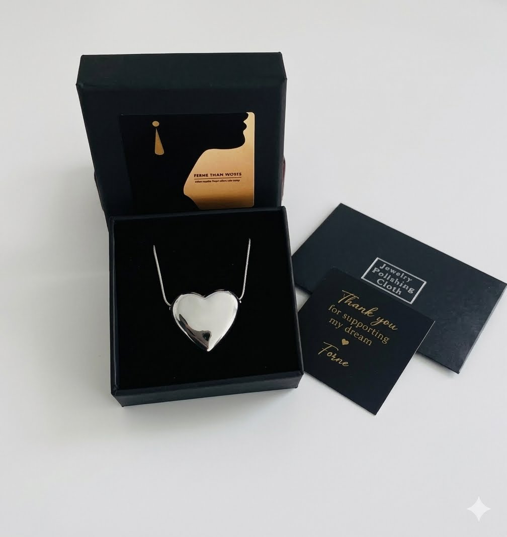 The 18k White Gold Plated Infinite Puff Heart Necklace